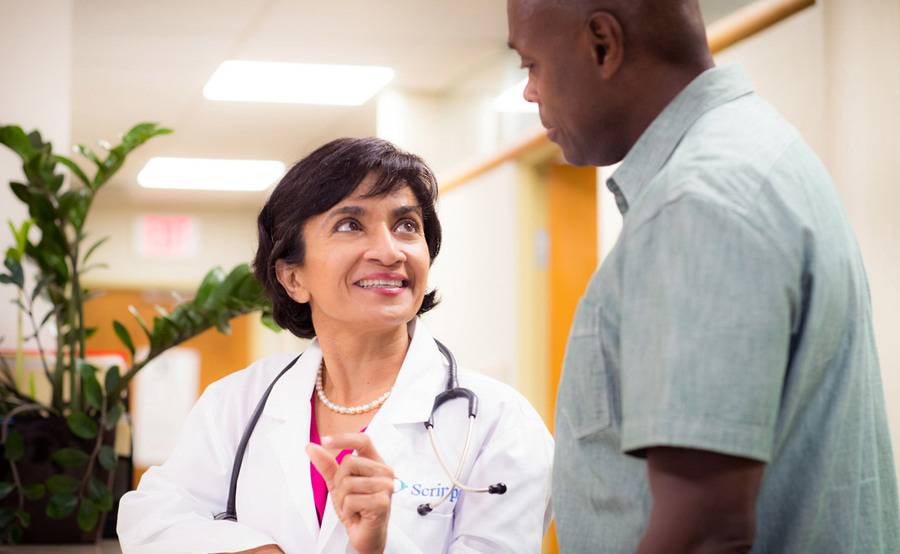 Dolly Doctor, MD, internal medicine physician at Scripps Coastal Medical Center in Encinitas talks with a patient.