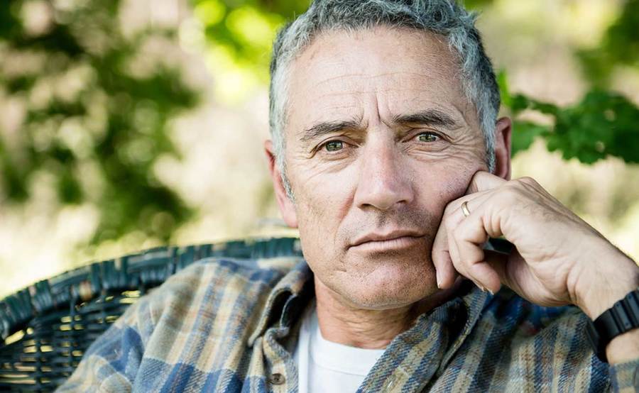 A heart failure patient in an outdoor setting contemplates the possibility of LVAD as a treatment option.