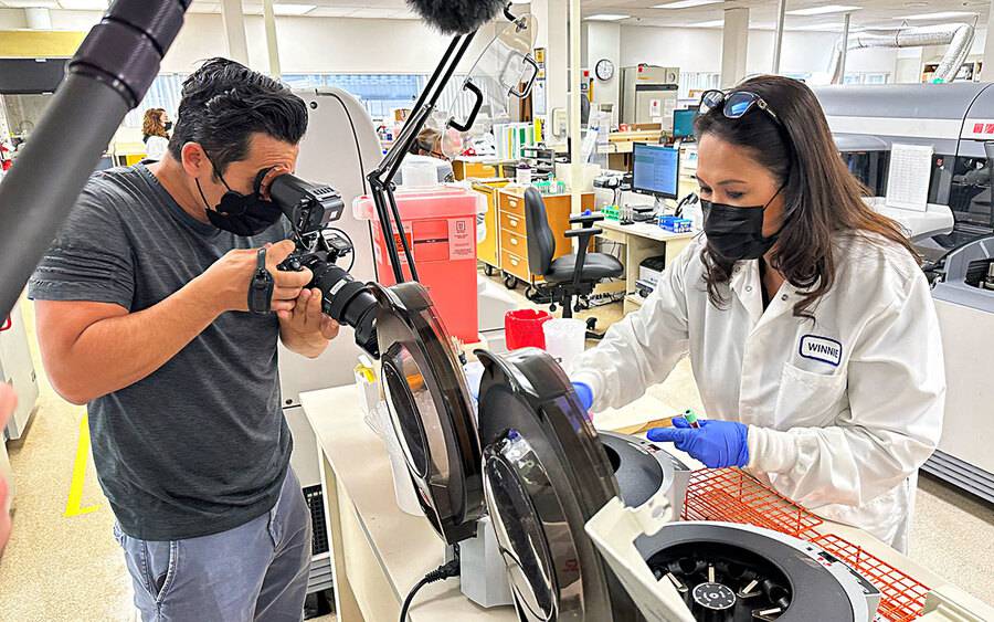 Winnie Carino, Scripps Mercy San Diego Laboratory Director prepares a test sample.