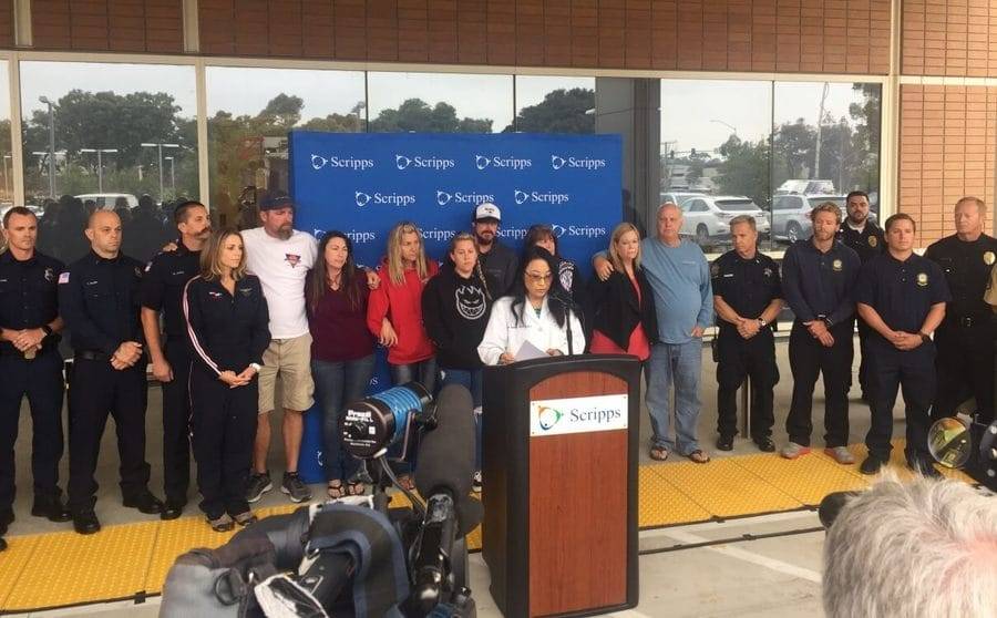 Scripps trauma surgeon Gail Tominaga, MD, issues a statement from a shark attack victim's family to the members of the press.