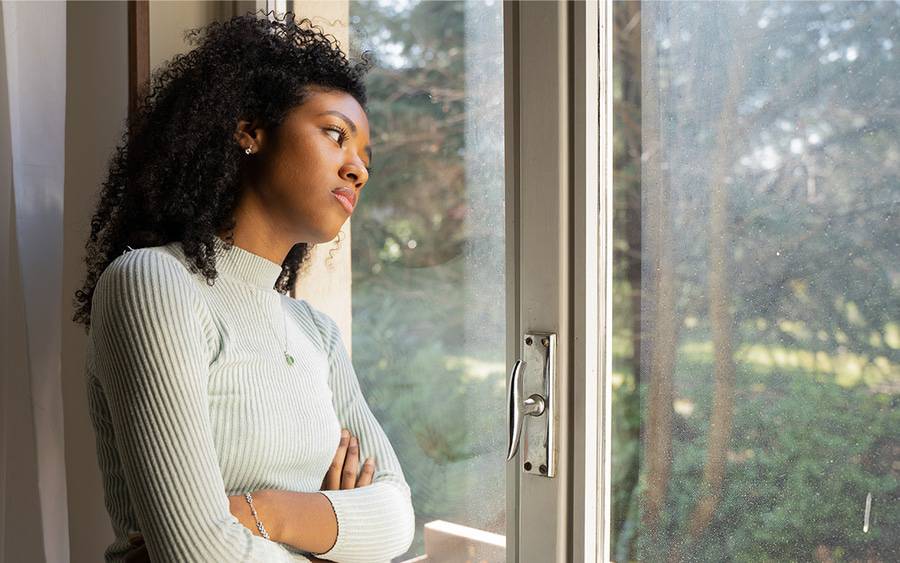 A lonely woman at risk of chronic illness due to depression.