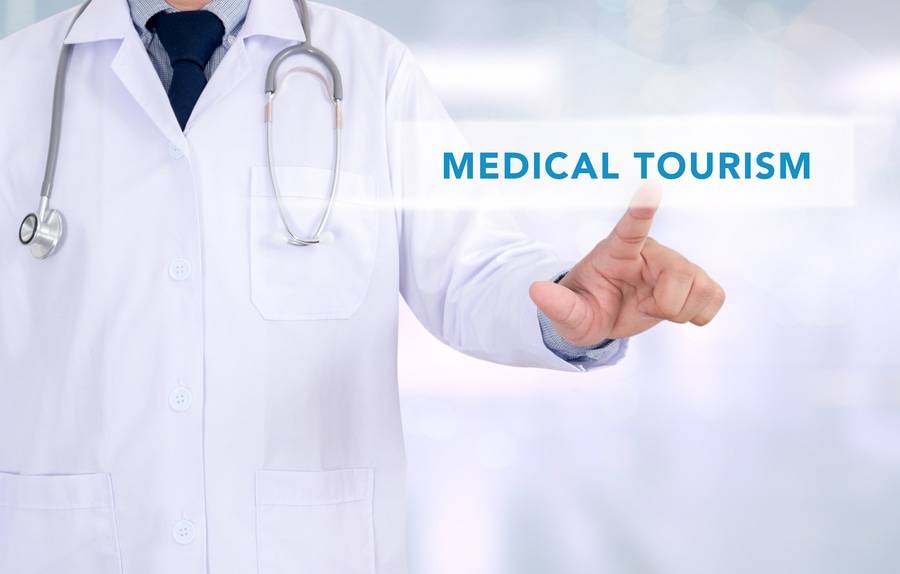 Physician in a lab coat with a stethoscope.