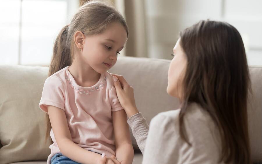 Parent talking to child about new coronavirus.