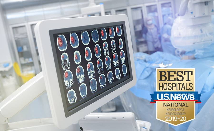 A computer screen shows brain scan images, representing the high-tech approach to neurosurgery at Scripps.