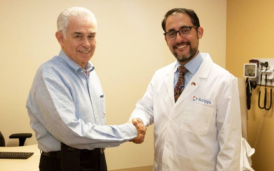 Rodolfo Nelson-Culebro of Mexico shakes hands with a Scripps doctor following a successful heart care appointment.