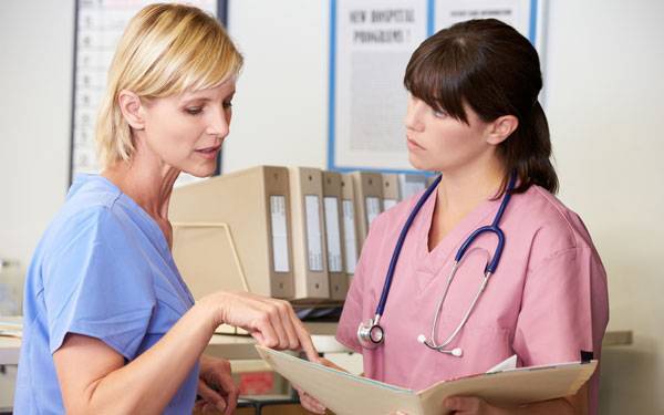 Nurses-at-the-nursing-station, Scripps Health, San Diego.