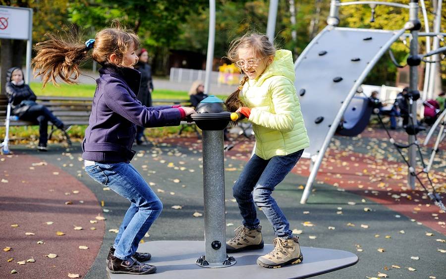 Young girls playing in playground