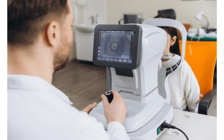 Doctor conducting retinal screening of patient with diabetes.