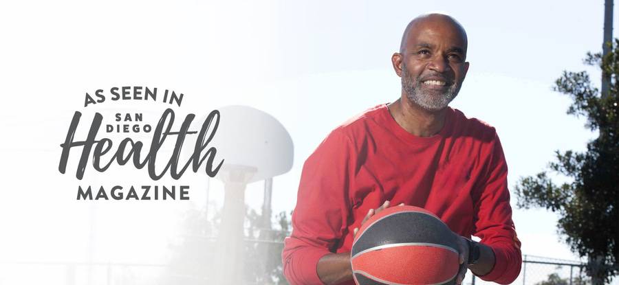 Rodney Billingsley with a basketball in his hands.