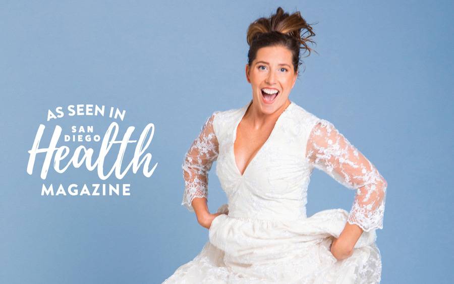 Sarah Swiss jumps in the air in a wedding dress, representing her renewed energy and fitness after spine surgery.