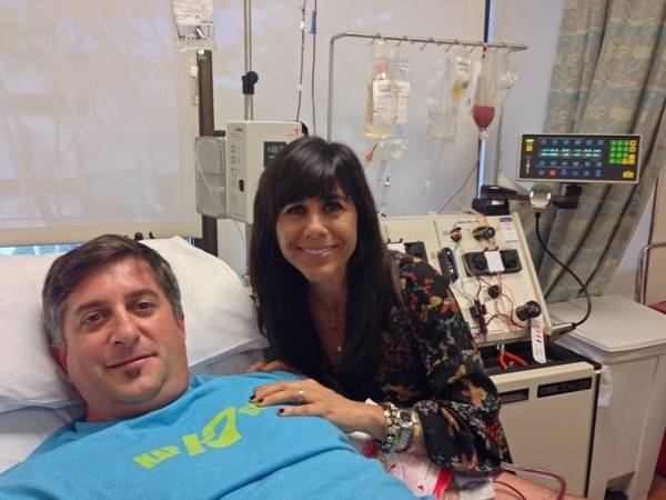 Two-time Olympic gold medalist Brad Schumacher was joined by Gina Cousineau during his stem cell donation at Scripps Green Hospital.