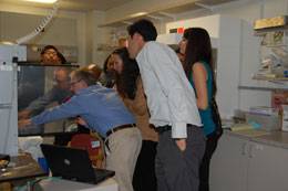 SCORE researcher Shawn Grogan, PhD gives students a tour of the laboratory.