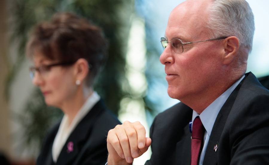 Scripps Health President and CEO Chris Van Gorder listens attentively during a meeting to inspire others that they're heard.