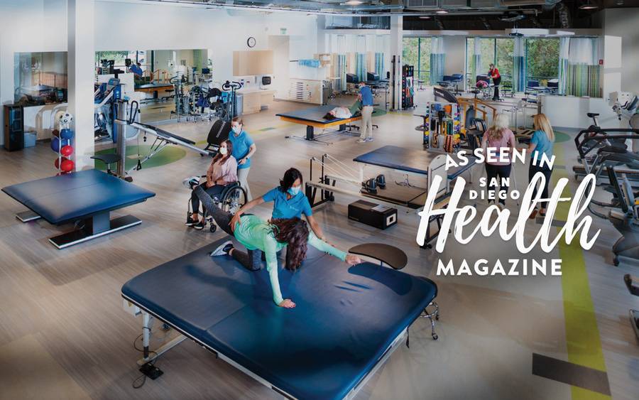 Inside the Scripps Encinitas Rehabilitation Center, several patients work with physical therapists on strength, mobility and range of motion.