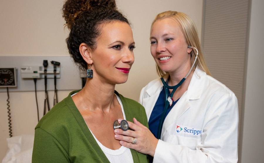 A nurse practitioner examines a patient at Scripps HealthExpress, a walk-in clinic with locations throughout San Diego. 