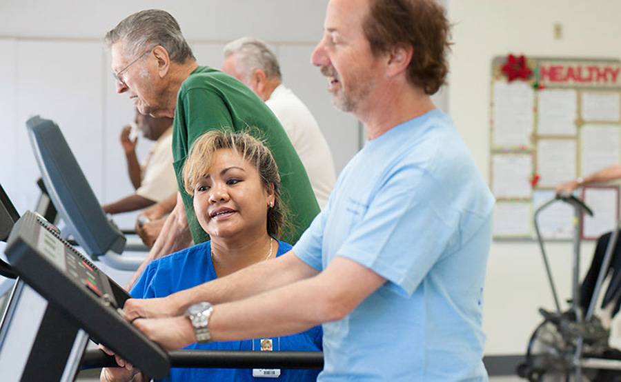 Heart patients exercising on equipment while their vital signs are monitored at the Scripps Cardiac Rehabilitation program.