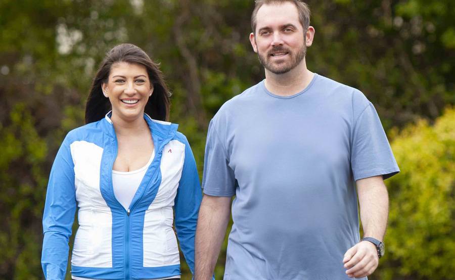 A male heart failure survivor walks with his female partner, representing the positive stories of heart patients at Scripps.