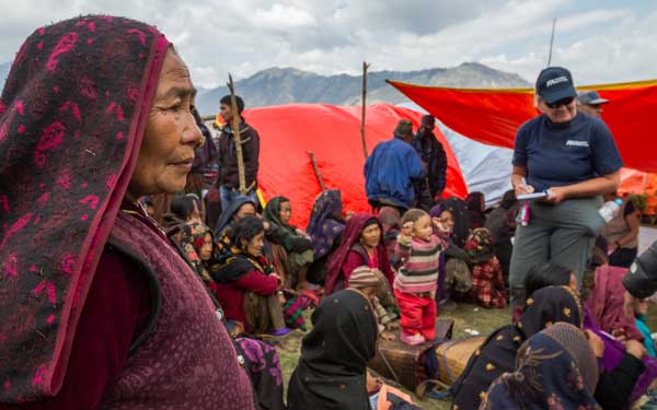 Scripps Health Medical Response Team member Jan Zachry, RN, works in a temporary medical clinic serving a remote mountainous village damaged by the recent earthquakes in Nepal. (Photo credit: International Medical Corps)
View high-resolution image