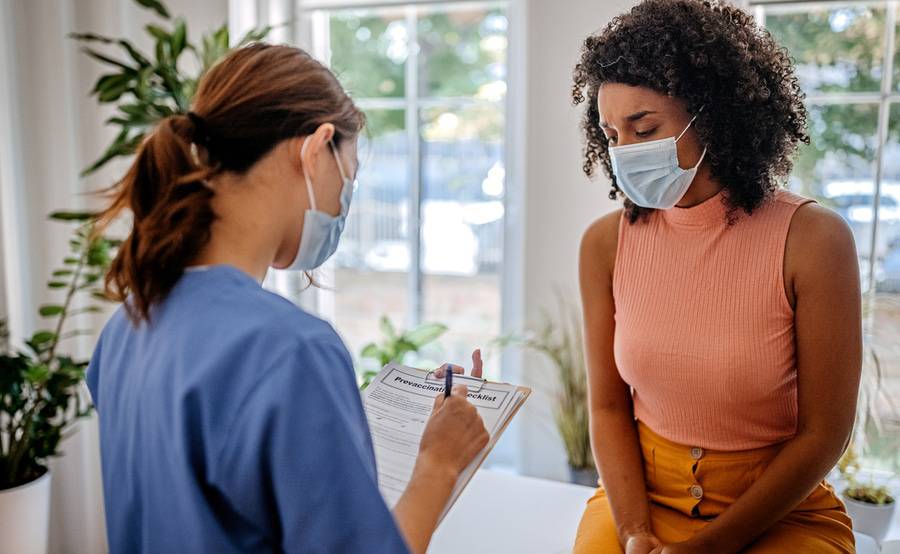 A concerned patient consulting with her provider at Scripps HealthExpress Solana Beach.