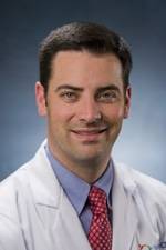 Dr. Curtiss Stinis, MD