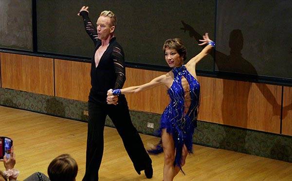 Oncologist Dr. Irene Hutchins dances with cancer patient Steve Valentine after his recovery.