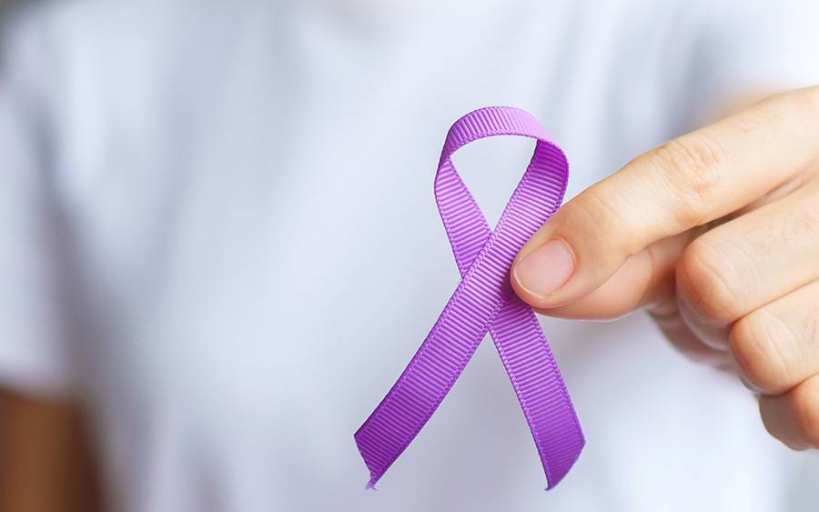 A purple ribbon recognizing testicular cancer, which is most common among men ages 15-24.