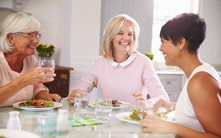 Diverse group of women eating healthy