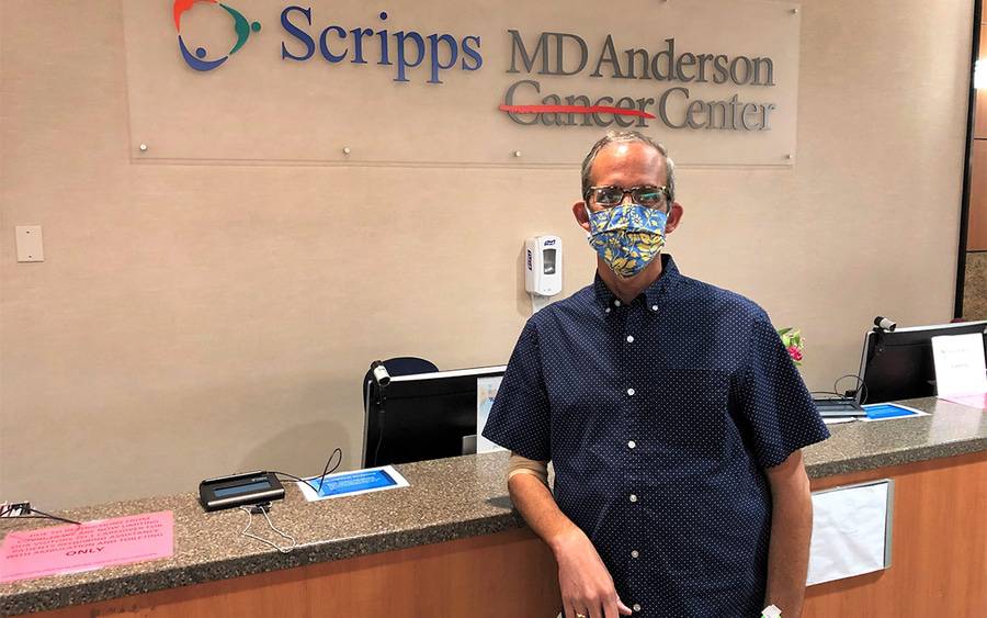 Scripps MD Anderson Cancer Center patient. Jim Gonzales, wears a face mask and prepares to resume his cancer treatment.