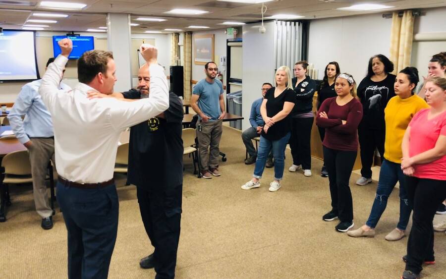 Scripps Health security investigator Ryan Sommer leads a class on how to deal with workplace violence.