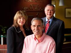 Mary and Gary West (standing) with Eric J. Topol, M.D. (center).