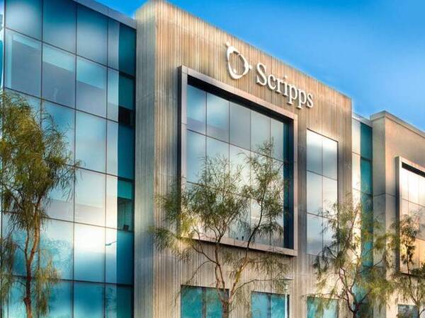 The exterior of Scripps Coastal Medical Center San Marcos with a line of small trees in front.