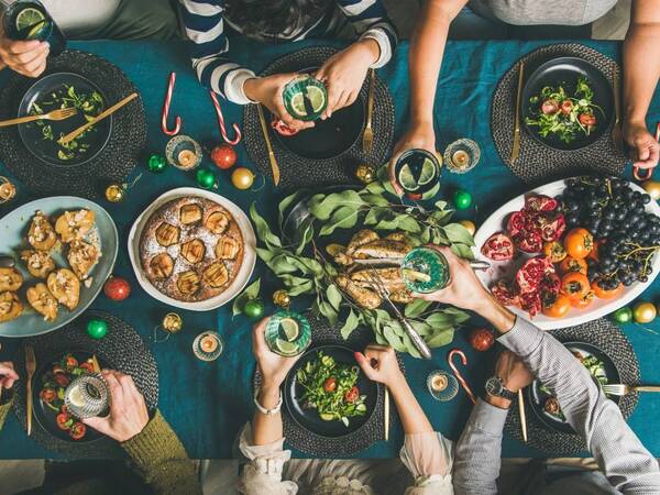 Holiday gathering with healthy, nutritious meal that emphasizes the meaning of mindful healthy eating.