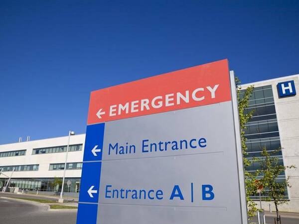 Hospital emergency entrance directional sign