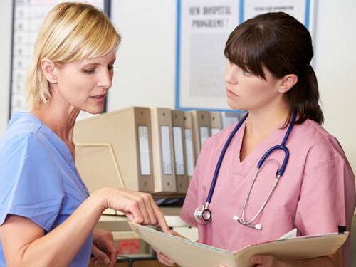 Nurses-at-the-nursing-station, Scripps Health, San Diego.