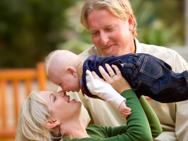 The Klassen family gathers together for a playful moment in the park to honor National Nurses Week after receiving quality care from Scripps Health. 