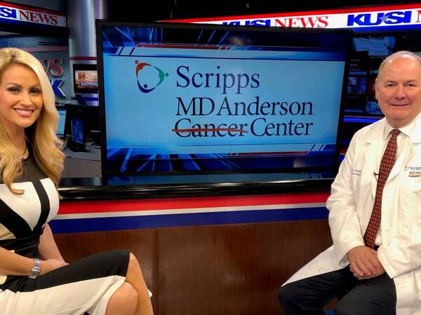 KUSI anchor Lauren Phinney with Thomas Buchholz, MD, medical director of Scripps MD Anderson Cancer Center.