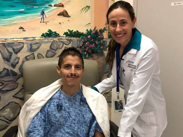 Cancer patient William Apodaca and Marin Xavier, MD, oncologist at Scripps MD Anderson Cancer Center.