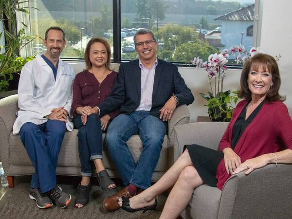 Randolph Schaeffer III, MD, transplant surgeon, and Annabelle Villarreal and Roberto Villarreal and Susan Taylor on the set of San Diego Health video on kidney transplant program at Scripps.