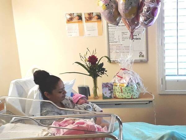 Elizabeth Morales and her baby Ainhara Banos, the first newborn in San Diego County in 2019, at Scripps Mercy Hospital Chula Vista.
