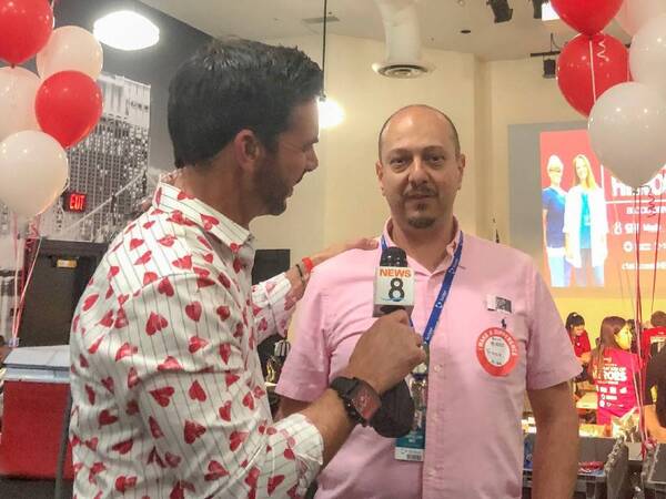 Local TV sports director and trauma survivor Kyle Kraska and Scripps trauma surgeon Fady Nasrallah, MD, at Kraska's Valentine's Day blood drive.
