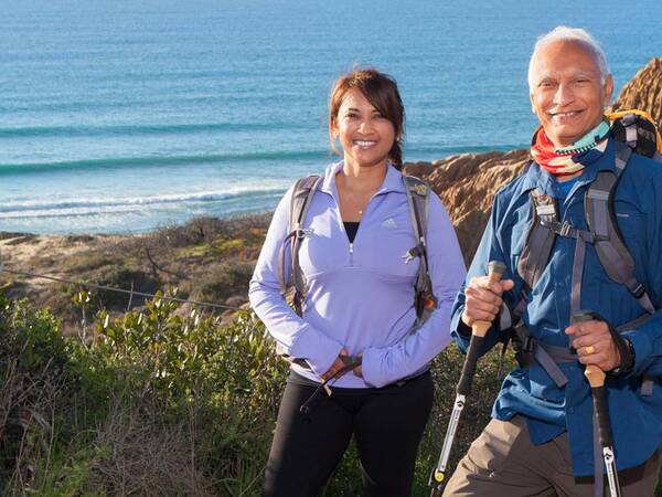 Scripps family medicine doctor Sravanthi Tripuraneni and her father, radiation oncologist Prabhakar Tripuraneni, hike together at Torrey Pines State Reserve.