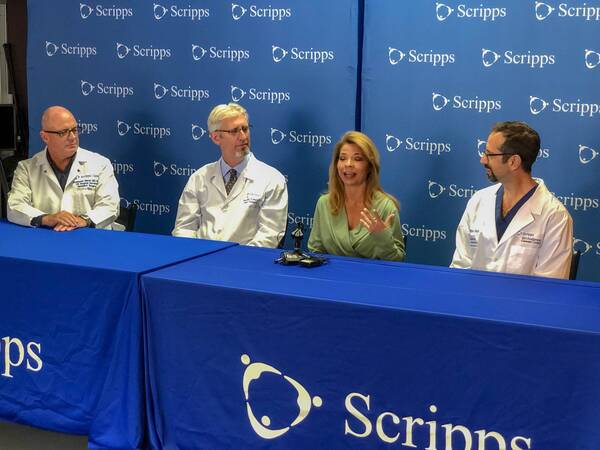 Dr. Christopher March, Dr. Jonathan Fisher, Patient Haley Gibbons, and Dr. Randolph Schaffer at press conference discussing hero walk for living organ donors.