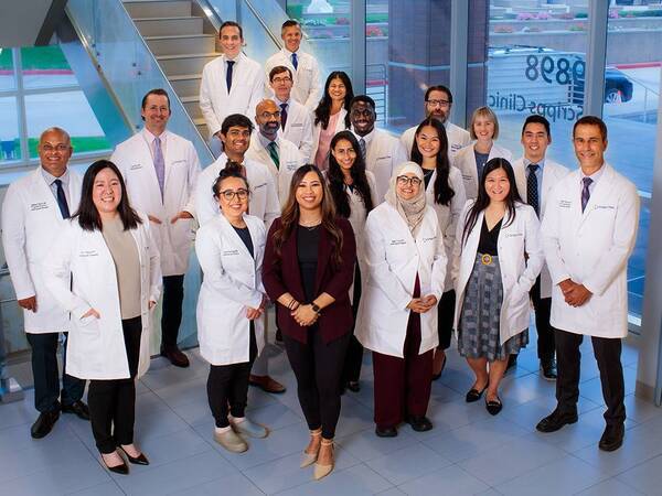 Members of the Scripps Cardiovascular Disease Fellowship Program gather for a photo at the Scripps Clinic John R. Anderson V Medical Pavilion in La Jolla.