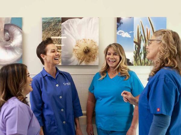 Scripps volunteers chat and laugh during a break.