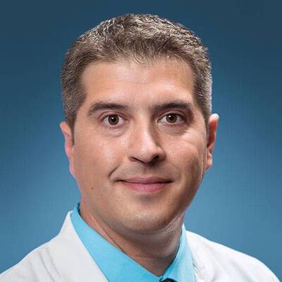 Omar Ghausi, MD