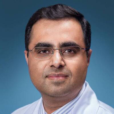 Anuj Mahindra, MD