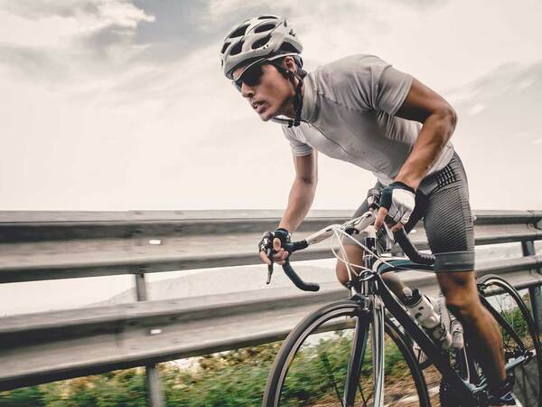 A bicyclist resumes his favorite sport after undergoing successful sports therapy treatment at Scripps Health. 