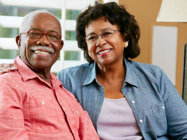 A smiling middle-aged couple represents the full life that can be led after pancreatic cancer treatment.